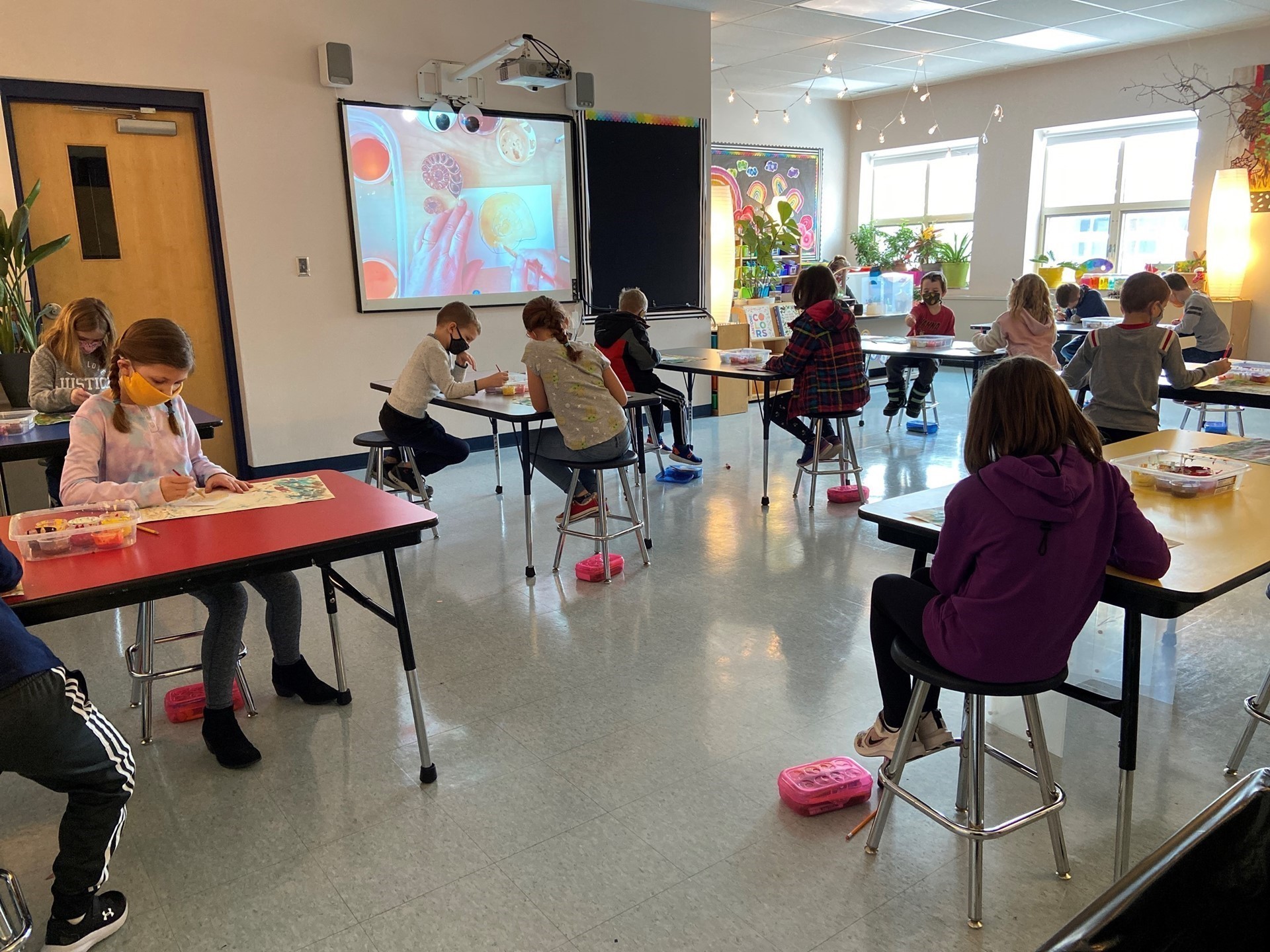 Students working in art class. 