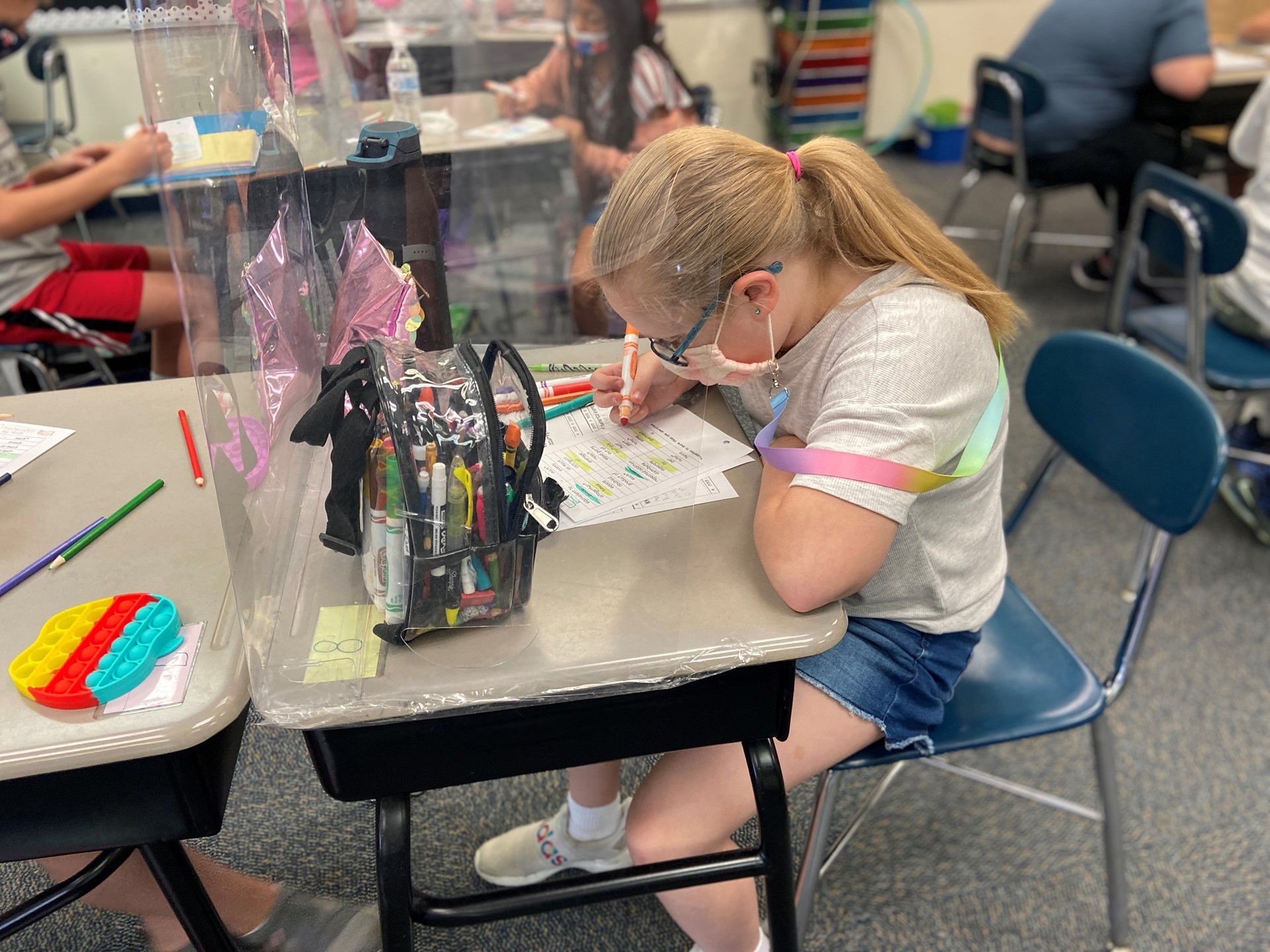 A student works independently on their classwork. 
