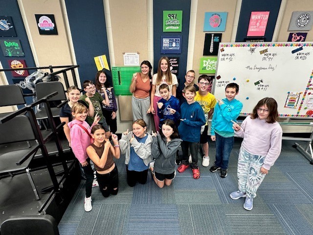 6th grade choir get their karate belts. 