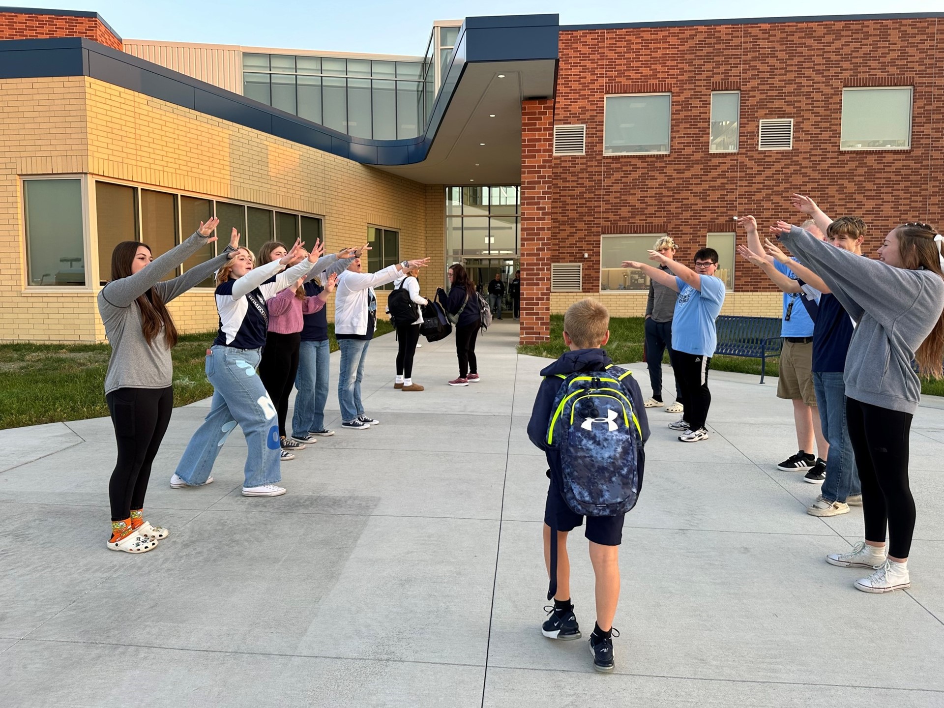 Student greeted at Lake Elementary by high school band and choir members. 