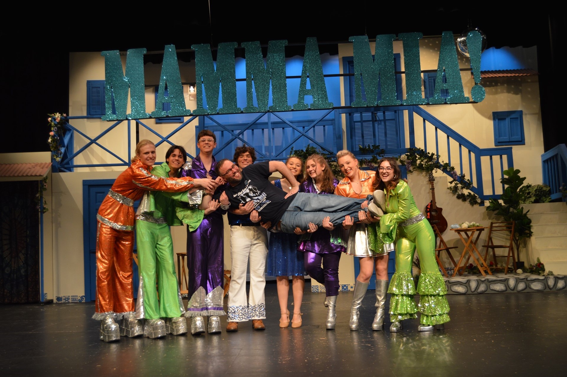 Mama Mia director and staff members. 