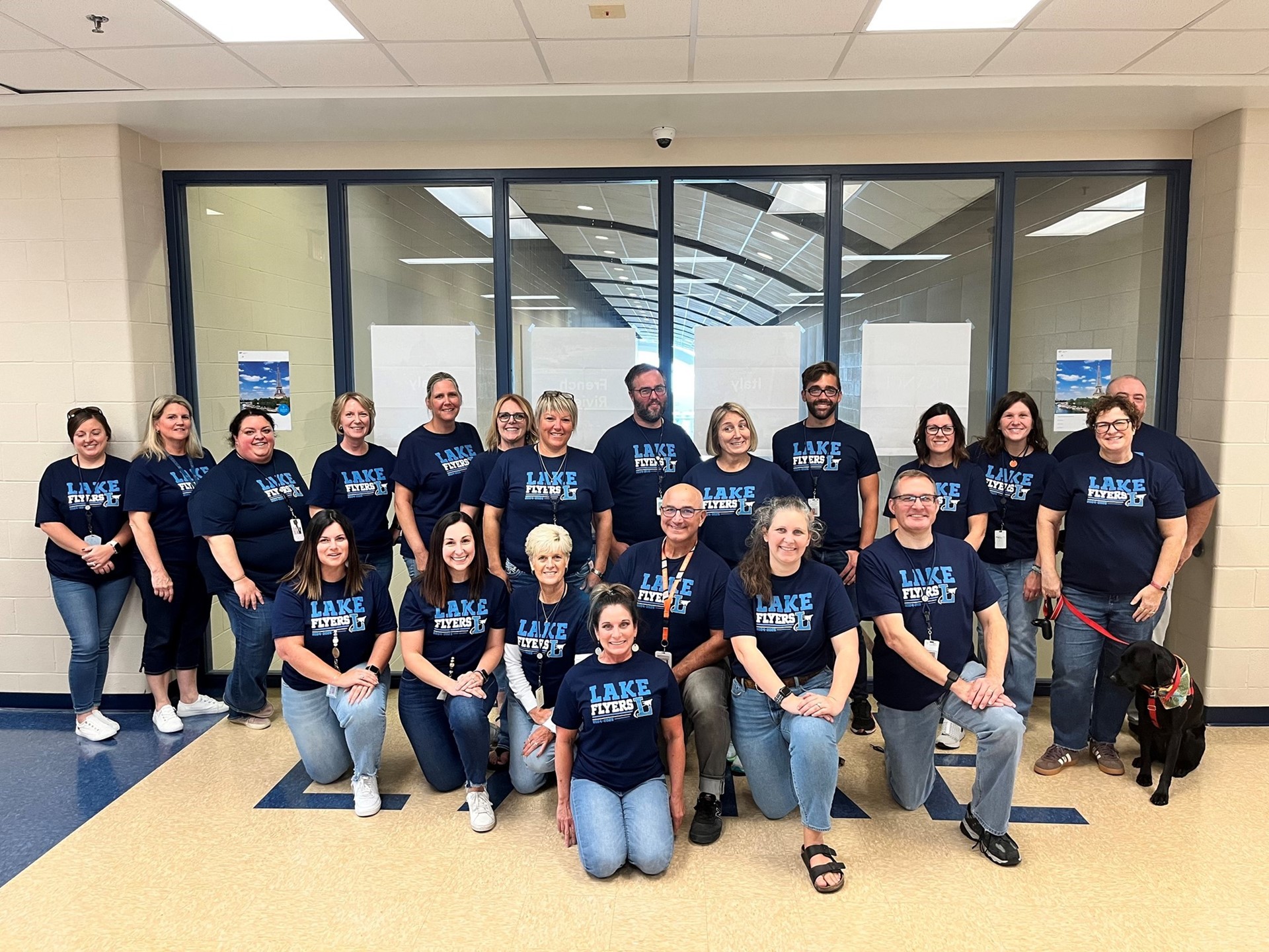 Staff members wearing be great shirts. 